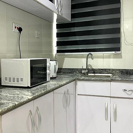 Blueocean-Cog Apartment And Lodging Бенин-Сити Экстерьер фото